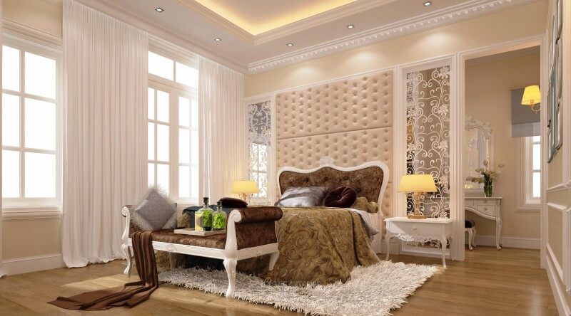Giường gỗ tân cổ điển với tone màu sành điệu, từng đường nét hoa văn điêu khắc vô cùng tinh xảo, chiếc đôn sofa cùng chất liệu được bố trí ở phía cuối giường tạo cho gia chủ có một không gian riêng tư sang trọng, gọn gàng và ngăn nắp hơn